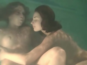 Lesbian foreplay with two babes underwater