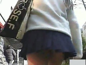 Asian belles get their underskirts filmed