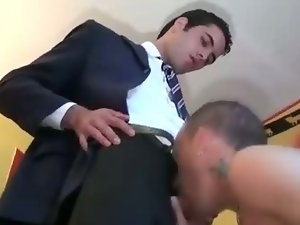 Gay guy in suit assfucks and gets sucked by computer dude