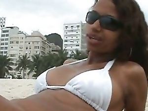 Hot brazilian lady teasing on the beach