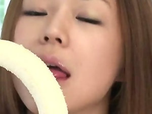 Serina shows her love for fruit as she licks and sucks her bananna