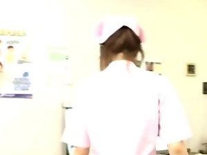 Japanese nurse cock jerking and cumshot action