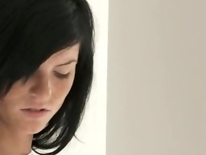 Unique blackhaired woman with freckles
