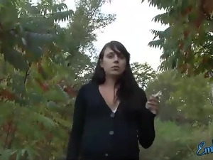 Brunette amateur goes out for a walk in the bushes for a smoke