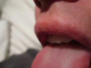 Attractive cumming on tongue