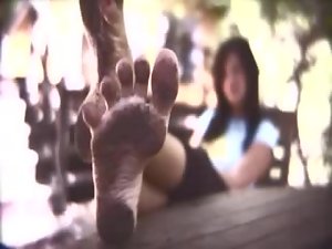 Chick stomping in dirty for foot fetish fans