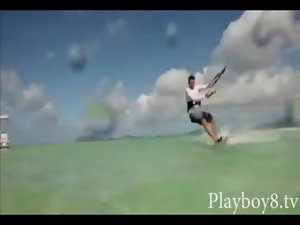 Three lusty chesty playmates try out naked kite surfing