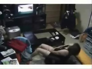 My slutty mom in living room masturbates watching TV. Hidden cam