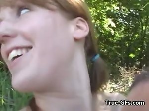 Lewd buxom redhead screwed in the woods