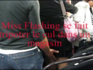 A voyeur caress butt of Miss Flashing59 in a store
