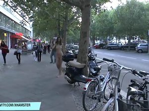 Wild nude slutty girl has fun on public streets
