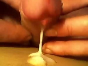 Attractive cumshot in a close up sequence as the chap orgasms