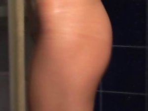 Sex partner soaping up her body in shower clip