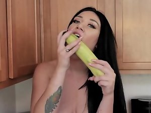 Depraved brunette is rubbing her pussy with a banana